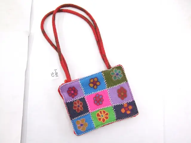 We can see bag with different colors flowers of bag such as blue,yellow,green,black,,
