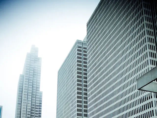 This image is clicked outside. There are many trees and skyscrapers in this image. In the front,...